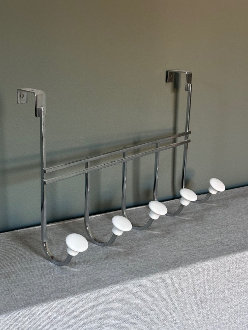 Container Store: Chrome 5-Hook Over-the-Door Rack with White Ceramic Knobs
